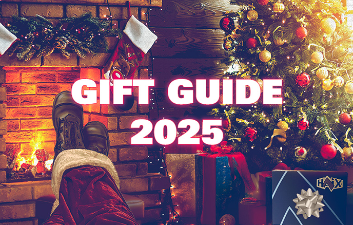 HAIX Gift Guide 2025 with XR1 Pro boots worn with santa pants by a fireplace, a christmas tree, and wrapped presents